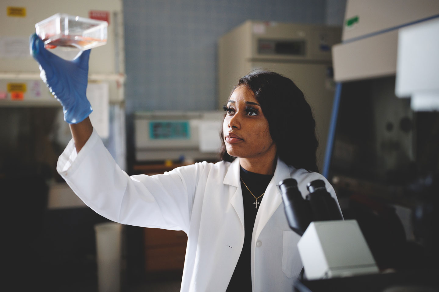 A young female scientist doing research.