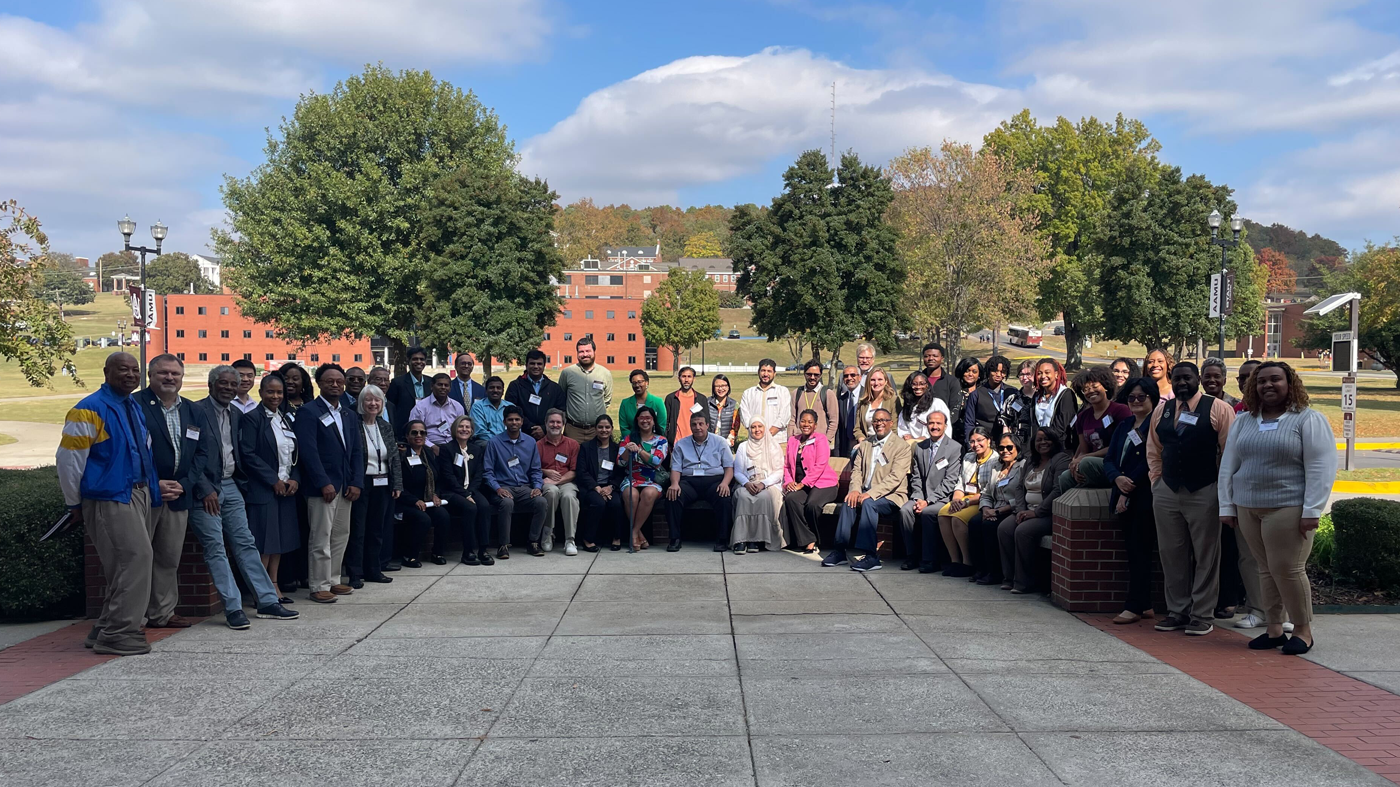 AAMU attendee professionals gathering for a group photo.