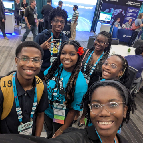 Six students taking a photo at PEARC conference.